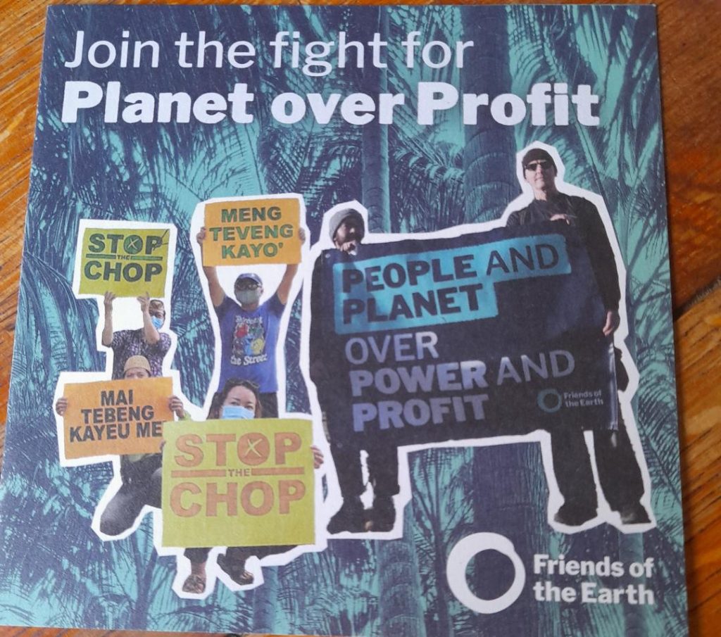 The picture shows the front of a leaflet with images stressing People and Planet over Power and Profit